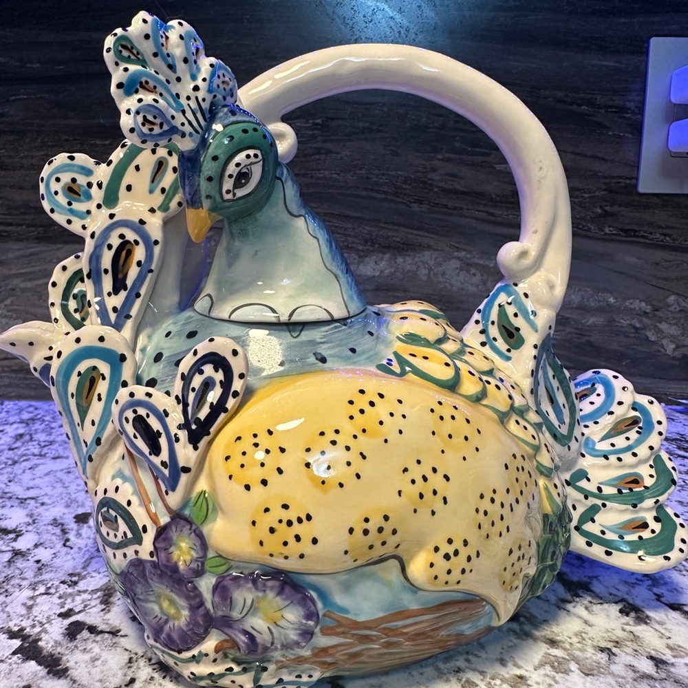 Blue and Yellow Ceramic Art Vessel with Intricate Design